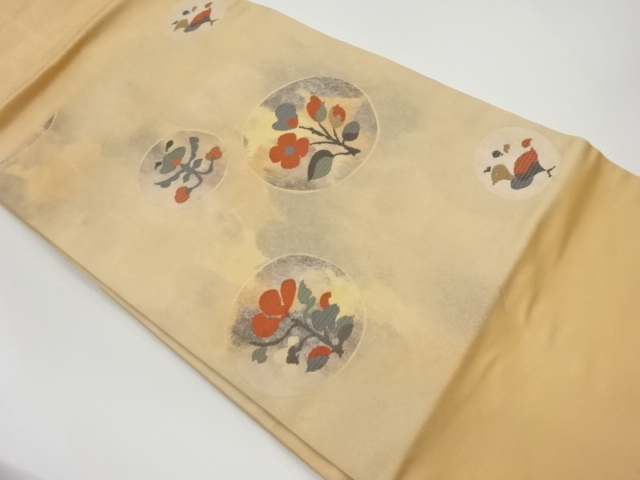 丸に抽象花鳥模様織出し名古屋帯